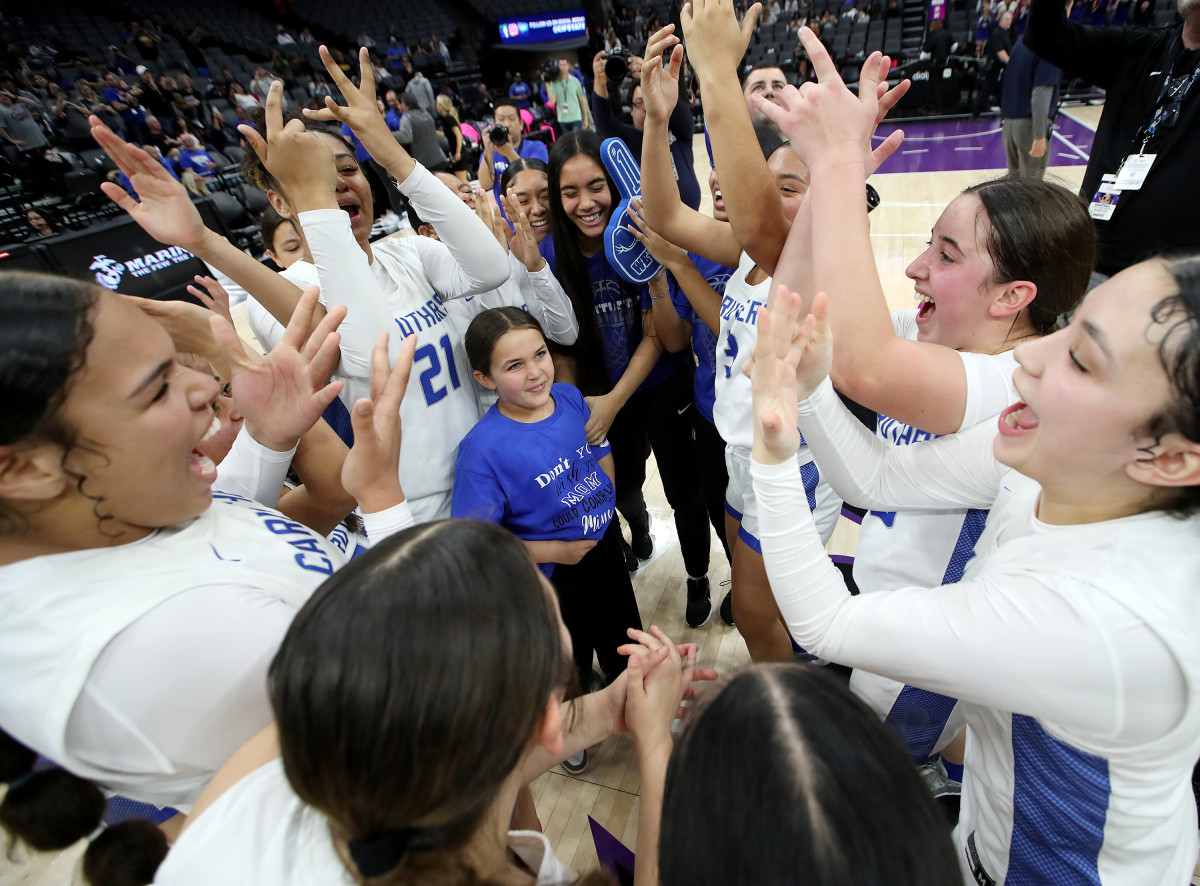 Caruthers celebrating its state championship win over Granada Hills Charter. 